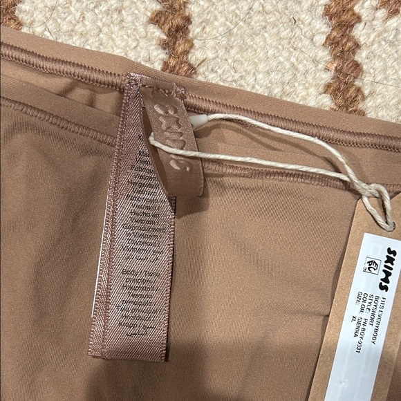SKIMS High Waist Tan Shorts - Picture 2 of 5
